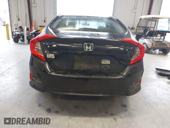 2016 Honda Civic Sedan LX with VIN 19XFC2F59GE017820, listed as a IAAI auction lot 41406871 with 126,376 mi miles. Bid and sale history available at carsss.com. Image 16.