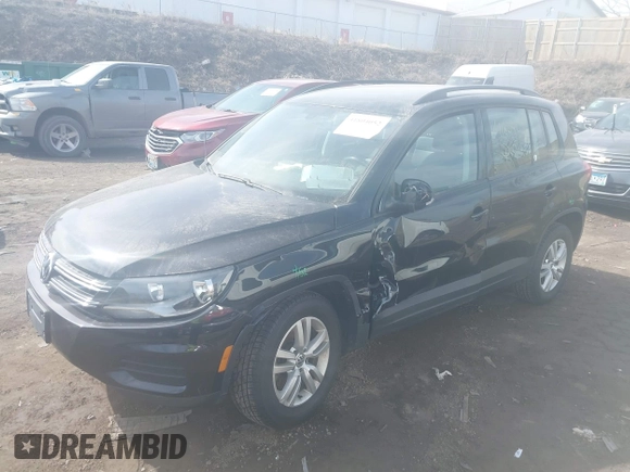 2017 Volkswagen Tiguan S with VIN WVGBV7AX9HK018085, listed as a IAAI auction lot 41804052 with 71,943 mi miles and . Bid and sale history available at DreamBid. Image 2.