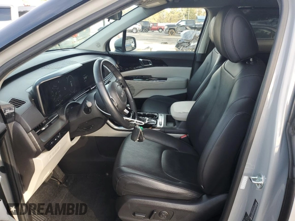 2023 Kia Carnival SX with VIN KNDNE5H36P6211360, listed as a Copart auction lot 88350205 with 52,145 mi miles and Salvage Title. Bid and sale history available at carsss.com. Image 7.