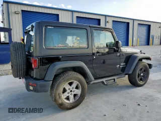 2015 Jeep Wrangler Freedom Edition with VIN 1C4AJWAG8FL541675, listed as a Copart auction lot 62647855 with 53,915 mi miles and Salvage title. Bid and sale history available at DreamBid. Image 3.