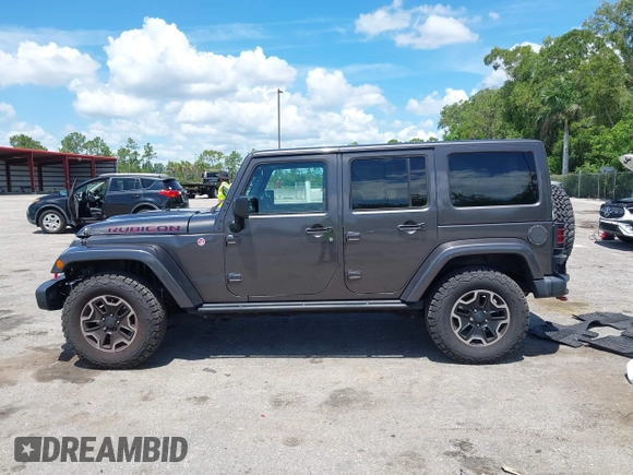2017 Jeep Wrangler Unlimited Rubicon Recon with VIN 1C4HJWFG2HL560846, listed as a IAAI auction lot 42532745 with 101,285 mi miles and . Bid and sale history available at DreamBid. Image 14.