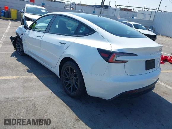 2025 Tesla Model 3 Long Range with VIN 5YJ3E1EA4SF903567, listed as a IAAI auction lot 42453246 with 19,365 mi miles and . Bid and sale history available at DreamBid. Image 3.