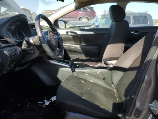 2019 Nissan Sentra S z VIN 3N1AB7AP3KY213698, wystawiony jako Copart lot #77969284 z przebiegiem 80 439 mil mil oraz Szkoda całkowita • Salvage title. Historia ofert i sprzedaży dostępna na DreamBid. Obrazek 7.