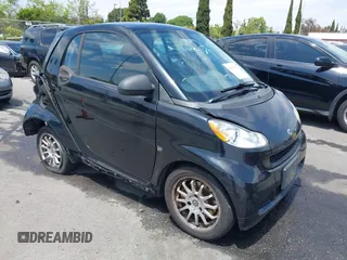 2012 Smart fortwo Pure z VIN WMEEJ3BA1CK556029, wystawiony jako IAAI lot #42173735 z przebiegiem 85 133 mil mil oraz . Historia ofert i sprzedaży dostępna na DreamBid. Obrazek 1.