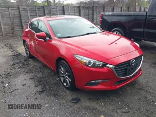 2018 Mazda 3 Touring z VIN 3MZBN1L39JM262035, wystawiony jako IAAI lot #42283342 z przebiegiem 47 429 mil mil oraz . Historia ofert i sprzedaży dostępna na DreamBid. Obrazek 1.