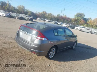 2012 Honda Insight EX z VIN JHMZE2H70CS004787, wystawiony jako IAAI lot #40668475 z przebiegiem 127 599 mil mil oraz . Historia ofert i sprzedaży dostępna na DreamBid. Obrazek 4.