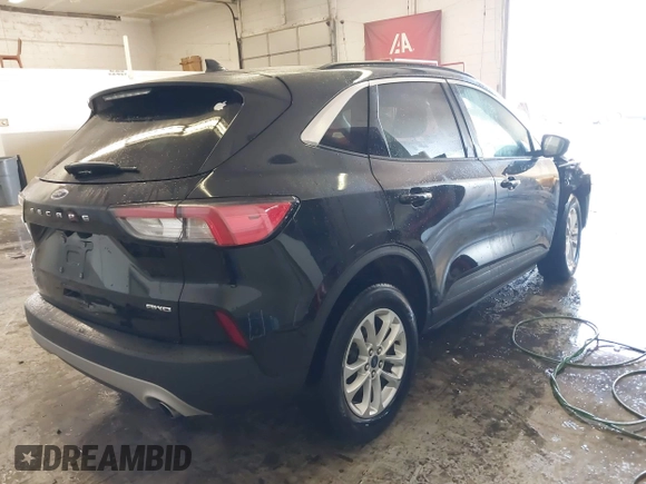 2020 Ford Escape SE with VIN 1FMCU9G6XLUC71527, listed as a IAAI auction lot 41420952 with 70,886 mi miles and . Bid and sale history available at DreamBid. Image 4.