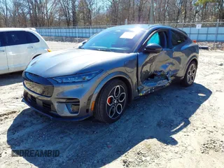 2023 Ford Mustang Mach-E GT with VIN 3FMTK4SE4PMA57053, listed as a IAAI auction lot 41603686 with 16,537 mi miles and . Bid and sale history available at DreamBid. Image 2.