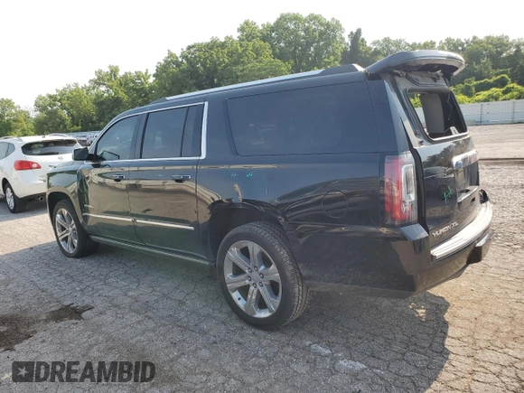 2019 GMC Yukon XL Denali with VIN 1GKS2HKJ7KR174772, listed as a Copart auction lot 63087134 with 69,692 mi miles and Salvage Title. Bid and sale history available at carsss.com. Image 2.