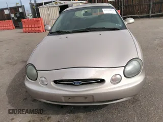 1999 Ford Taurus SE with VIN 1FAFP53S9XA330603, listed as a IAAI auction lot 41819819 with 207,025 mi miles. Bid and sale history available at carsss.com. Image 6.