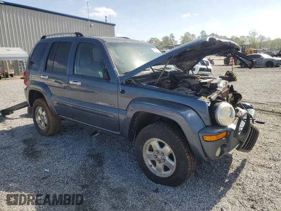2002 Jeep Liberty Limited with VIN 1J8GL58K32W144319, listed as a Copart auction lot 51571025 with 145,913 mi miles and Salvage title. Bid and sale history available at DreamBid. Image 4.