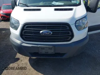 2015 Ford Transit Cargo with VIN 1FTNE2CM4FKA29323, listed as a IAAI auction lot 42406192 with 156,493 mi miles and . Bid and sale history available at DreamBid. Image 6.