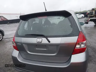 2007 Honda Fit Sport z VIN JHMGD38647S049521, wystawiony jako IAAI lot #42289057 z przebiegiem 130 434 mil mil oraz . Historia ofert i sprzedaży dostępna na DreamBid. Obrazek 16.