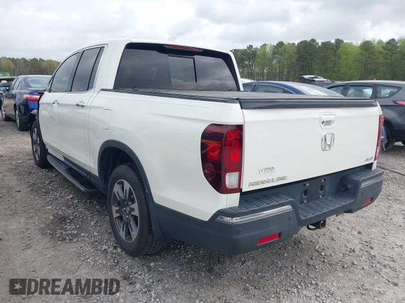 2019 Honda Ridgeline RTL-E with VIN 5FPYK3F78KB018356, listed as a IAAI auction lot 41946363 with 61,472 mi miles and . Bid and sale history available at DreamBid. Image 3.