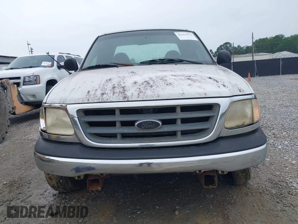 2001 Ford F-150 XL z VIN 1FTRX17L11NB54097, wystawiony jako IAAI lot #42353176 z przebiegiem 258 729 mil mil oraz . Historia ofert i sprzedaży dostępna na DreamBid. Obrazek 6.