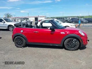 2017 MINI Convertible Cooper S with VIN WMWWG9C53H3C22950, listed as a IAAI auction lot 42297714 with 22,613 mi miles and . Bid and sale history available at DreamBid. Image 13.