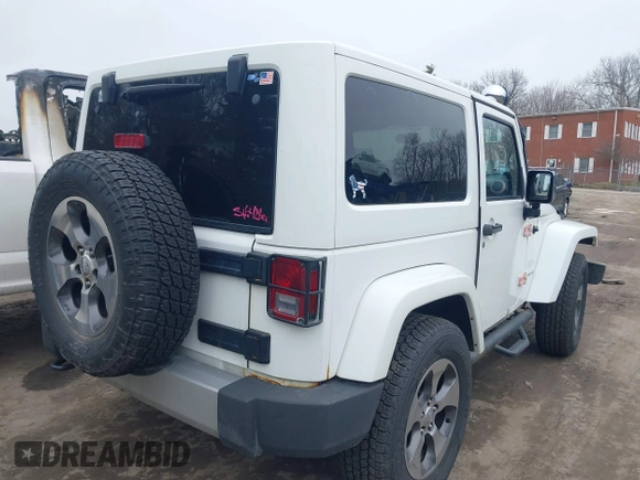 2011 Jeep Wrangler Sahara with VIN 1J4AA5D15BL538240, listed as a IAAI auction lot 41793836 with 172,528 mi miles and . Bid and sale history available at carsss.com. Image 4.