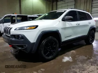 2015 Jeep Cherokee Trailhawk with VIN 1C4PJMBS7FW609741, listed as a Copart auction lot 42336145 with 125,711 mi miles and Clean Title. Bid and sale history available at carsss.com. Image 1.