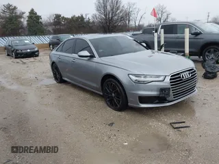 2016 Audi A6 2.0T Premium Plus with VIN WAUGFAFC1GN014536, listed as a IAAI auction lot 41937616 with 122,417 mi miles. Bid and sale history available at carsss.com. Image 1.