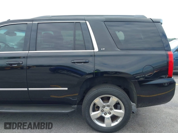 2015 Chevrolet Tahoe LT with VIN 1GNSCBKC4FR145119, listed as a IAAI auction lot 42309931 with 99,408 mi miles and . Bid and sale history available at DreamBid. Image 19.