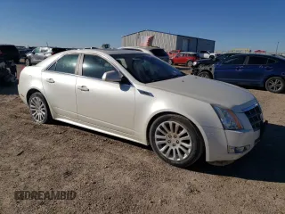 2011 Cadillac CTS Performance with VIN 1G6DJ5EY9B0105717, listed as a Copart auction lot 83389924 with 128,952 mi miles and Salvage Title. Bid and sale history available at carsss.com. Image 4.