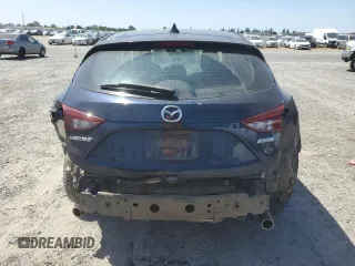 2015 Mazda 3 i Grand Touring z VIN 3MZBM1M72FM145070, wystawiony jako Copart lot #58419525 z przebiegiem 61 255 mil mil oraz Szkoda całkowita • Salvage title. Historia ofert i sprzedaży dostępna na DreamBid. Obrazek 6.