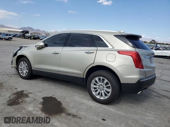 2017 Cadillac XT5 FWD with VIN 1GYKNARSXHZ158528, listed as a Copart auction lot 59761385 with 100,238 mi miles and Salvage title. Bid and sale history available at DreamBid. Image 2.