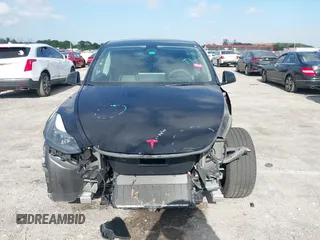 2024 Tesla Model Y Long Range z VIN 7SAYGDEE9RA293261, wystawiony jako IAAI lot #42118735 z przebiegiem 11 454 mil mil oraz . Historia ofert i sprzedaży dostępna na DreamBid. Obrazek 13.