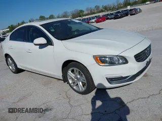 2015 Volvo S60 T5 Drive-E Platinum with VIN YV140MFM7F1346644, listed as a IAAI auction lot 41984716 with 78,210 mi miles. Bid and sale history available at carsss.com. Image 1.