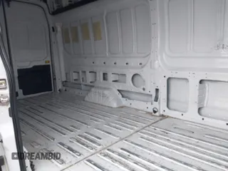 2024 Ford Transit Cargo z VIN 1FTBR3U86RKA14633, wystawiony jako IAAI lot #42500581 z przebiegiem 16 529 mil mil oraz . Historia ofert i sprzedaży dostępna na DreamBid. Obrazek 8.