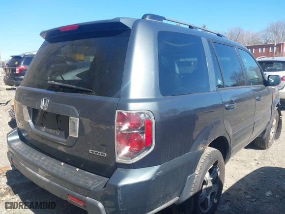 2006 Honda Pilot EX-L with VIN 2HKYF18596H500645, listed as a IAAI auction lot 41749033 with 242,599 mi miles. Bid and sale history available at carsss.com. Image 4.