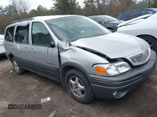 2002 Pontiac Montana with VIN 1GMDX03E92D261204, listed as a IAAI auction lot 41514460 with 175,551 mi miles and . Bid and sale history available at DreamBid. Image 1.