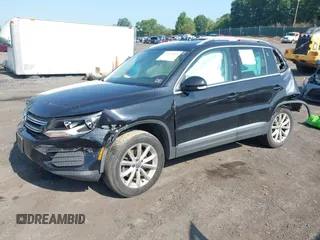 2017 Volkswagen Tiguan Wolfsburg Edition with VIN WVGSV7AX8HK028638, listed as a IAAI auction lot 42562548 with 80,315 mi miles and . Bid and sale history available at DreamBid. Image 2.