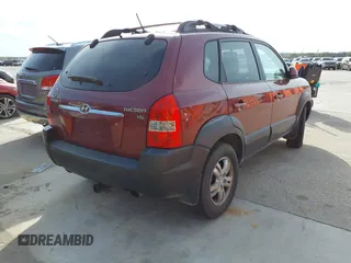 2006 Hyundai Tucson GLS with VIN KM8JN12D16U453097, listed as a IAAI auction lot 41819035 with 237,312 mi miles. Bid and sale history available at carsss.com. Image 4.