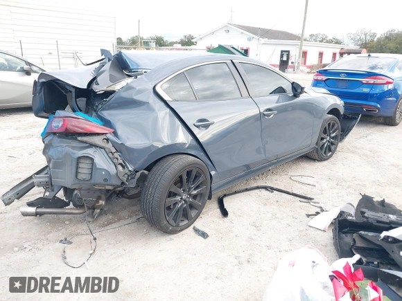 2022 Mazda 3 Carbon Edition z VIN JM1BPACL2N1509492, wystawiony jako IAAI lot #41198183 z przebiegiem Nie podano mil oraz . Historia ofert i sprzedaży dostępna na DreamBid. Obrazek 4.