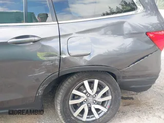 2019 Honda Pilot EX-L with VIN 5FNYF6H52KB035504, listed as a IAAI auction lot 42642735 with 54,736 mi miles and . Bid and sale history available at DreamBid. Image 6.