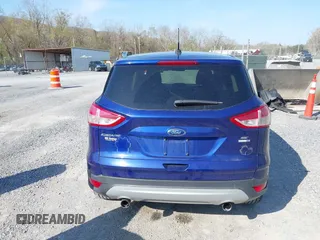 2013 Ford Escape SE with VIN 1FMCU9G94DUC21850, listed as a IAAI auction lot 42003396 with 182,663 mi miles. Bid and sale history available at carsss.com. Image 16.