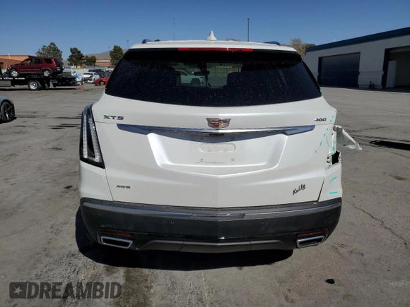 2021 Cadillac XT5 AWD Sport with VIN 1GYKNHRS2MZ156923, listed as a Copart auction lot 52696375 with 19,619 mi miles and Salvage title. Bid and sale history available at DreamBid. Image 6.