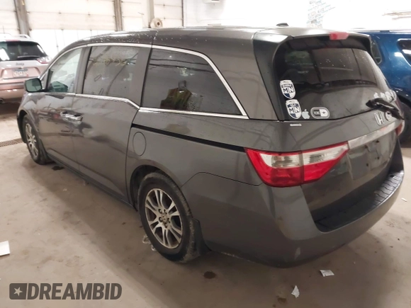 2011 Honda Odyssey EX-L with VIN 5FNRL5H67BB049446, listed as a IAAI auction lot 42116436 with 197,667 mi miles and . Bid and sale history available at carsss.com. Image 3.