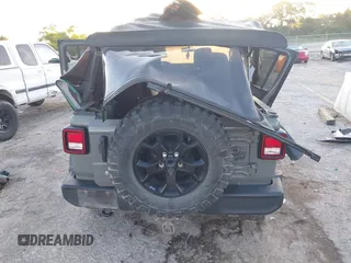 2022 Jeep Wrangler Unlimited Sport with VIN 1C4HJXDN9NW241154, listed as a IAAI auction lot 40211944 with 31,344 mi miles and . Bid and sale history available at DreamBid. Image 16.