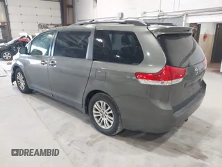 2011 Toyota Sienna XLE AAS with VIN 5TDYK3DC8BS111639, listed as a IAAI auction lot 42108488 with 300,872 mi miles and . Bid and sale history available at DreamBid. Image 3.