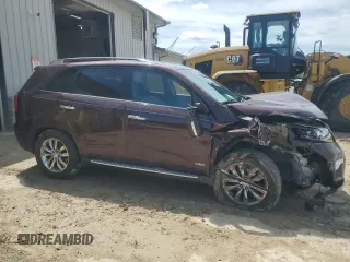 2012 Kia Sorento SX z VIN 5XYKWDA29CG301363, wystawiony jako Copart lot #55954815 z przebiegiem 83 206 mil mil oraz Szkoda całkowita • Salvage title. Historia ofert i sprzedaży dostępna na DreamBid. Obrazek 4.