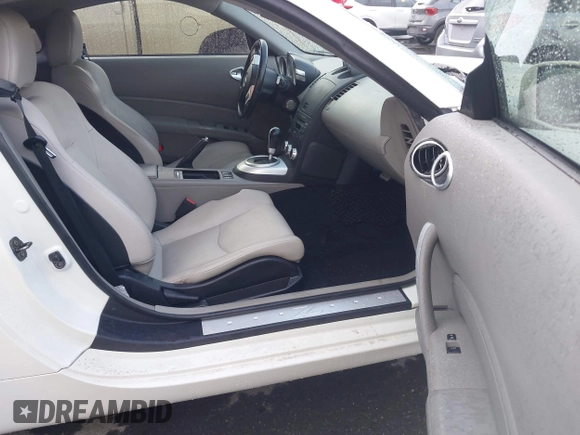 2007 Nissan 350Z Enthusiast z VIN JN1BZ34D17M501594, wystawiony jako IAAI lot #42256549 z przebiegiem Nie podano mil oraz . Historia ofert i sprzedaży dostępna na DreamBid. Obrazek 5.