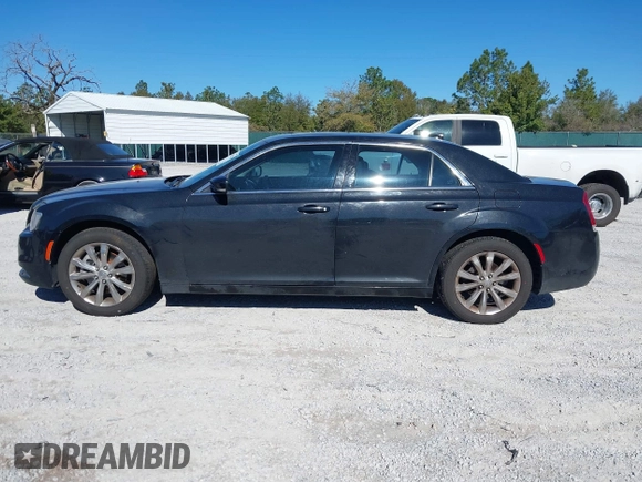 2015 Chrysler 300 Limited with VIN 2C3CCARG9FH838420, listed as a IAAI auction lot 41684228 with 242,316 mi miles. Bid and sale history available at carsss.com. Image 14.