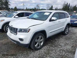 2013 Jeep Grand Cherokee Limited with VIN 1C4RJFBT0DC619216, listed as a IAAI auction lot 41703137 with 142,577 mi miles. Bid and sale history available at carsss.com. Image 17.