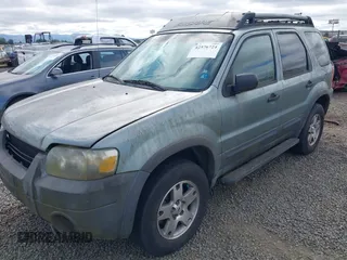 2005 Ford Escape XLT z VIN 1FMYU931X5KA69477, wystawiony jako IAAI lot #42576724 z przebiegiem 143 747 mil mil oraz . Historia ofert i sprzedaży dostępna na DreamBid. Obrazek 2.