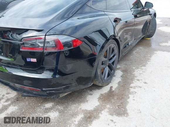 2022 Tesla Model S Plaid with VIN 5YJSA1E60NF460244, listed as a IAAI auction lot 41996403 with Not provided miles and . Bid and sale history available at DreamBid. Image 20.