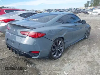 2021 Infiniti Q60 Red Sport 400 with VIN JN1FV7LKXMM530401, listed as a IAAI auction lot 41409153 with 31,247 mi miles and . Bid and sale history available at DreamBid. Image 4.
