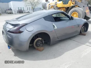 2012 Nissan 370Z Touring with VIN JN1AZ4EH4CM561415, listed as a IAAI auction lot 41838948 with 111,298 mi miles. Bid and sale history available at carsss.com. Image 4.