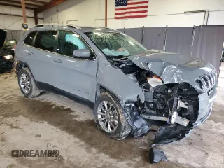 2019 Jeep Cherokee Latitude Plus with VIN 1C4PJMLX3KD469249, listed as a Copart auction lot 51704975 with 56,937 mi miles and Salvage Title. Bid and sale history available at carsss.com. Image 4.